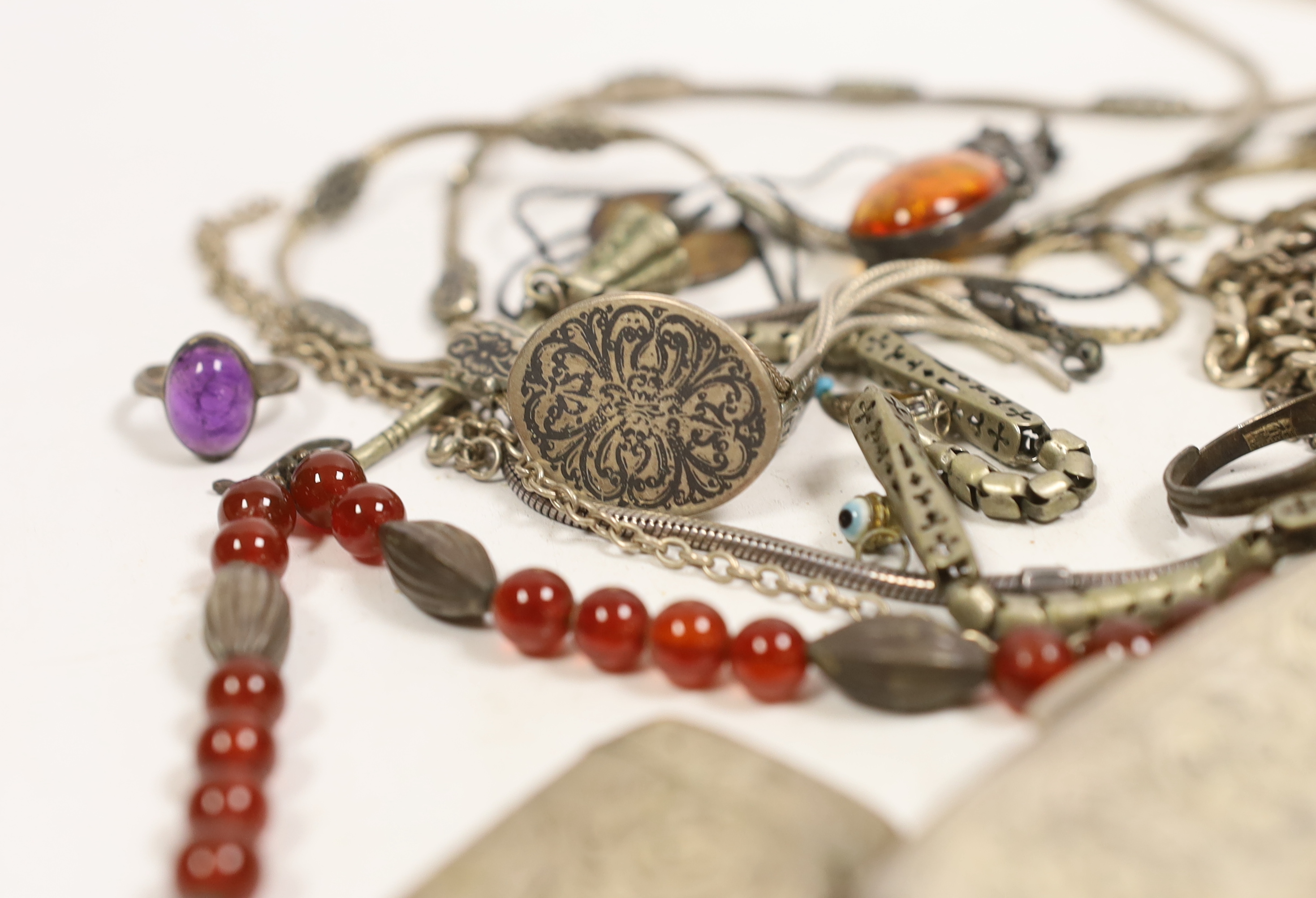 Miscellaneous silver including cigarette case, pepperette, bonbon dish, vesta case and belt buckle, a wrist watch and pocket watch and assorted jewellery including a large sterling mounted amber pendant and a Charles Hor